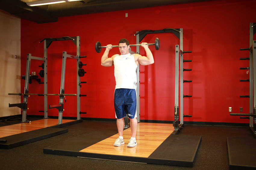 Standing Barbell Press Behind Neck